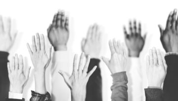 Multiethnic Group Of Hands Raised