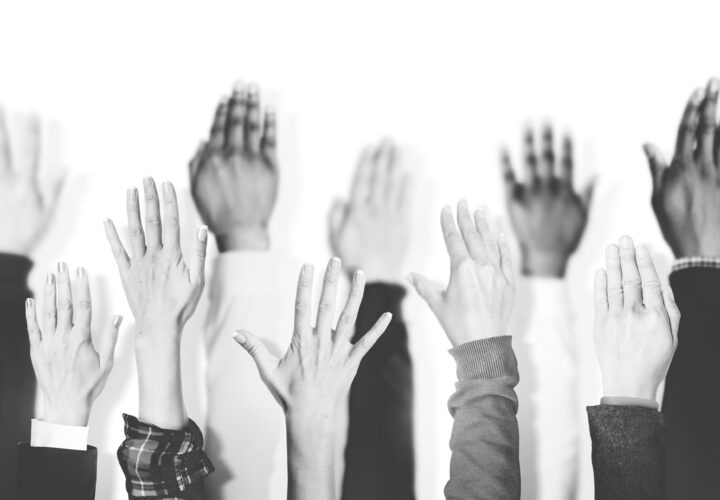 Multiethnic Group Of Hands Raised