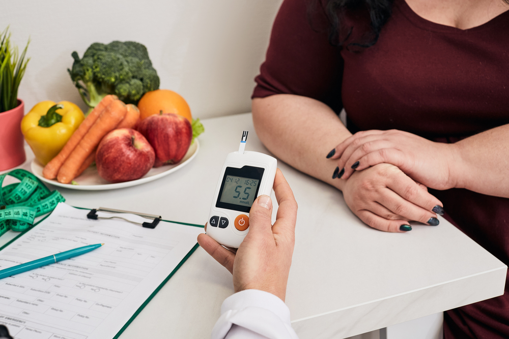Measuring,blood,sugar.,nutritionist,using,glucometer,tests,overweight,woman's,blood