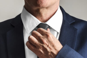 Businessman Wearing Tie, Getting Ready To Work