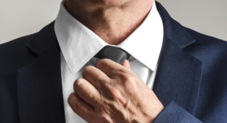 Businessman Wearing Tie, Getting Ready To Work