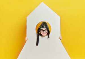 Portrait Of Smiling Boy In Rocket