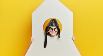 Portrait Of Smiling Boy In Rocket